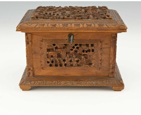A Chinese Canton carved wood jewel casket, the hinged lid carved in relief with populated garden landscape, the side panels s