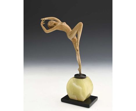 Josef Lorenzl, an Art Deco gilt bronze figure of a dancer, circa 1925, modelled nude with one knee up and arched back, on a m
