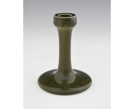 Ruskin Pottery, a Vine painted Souffle glazed candlestick, 1905, splayed trumpet form with poppy head sconce, sage green with