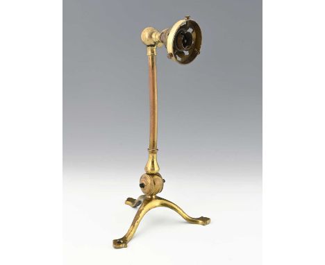 W A S Benson, an Arts and Crafts brass table lamp, circa 1900, on tripod base with trefoil feet, barrel form switch mechanism