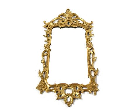 A George III carved giltwood and gesso pier glass, in the Rococo taste, entwined acanthus finial, openwork naturalistic branc