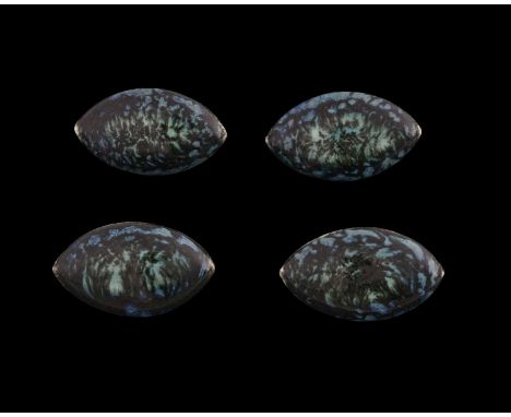 Ruskin Pottery, a set of four Souffle glazed buttons, lozenge form, marbled blue green, impressed marks, 4.5cm long (4)