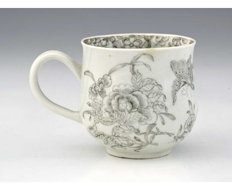 A Worcester porcelain pencilled cup, circa 1755, bell form, decorated in monochrome with peonies and chrysanthemums and a mot