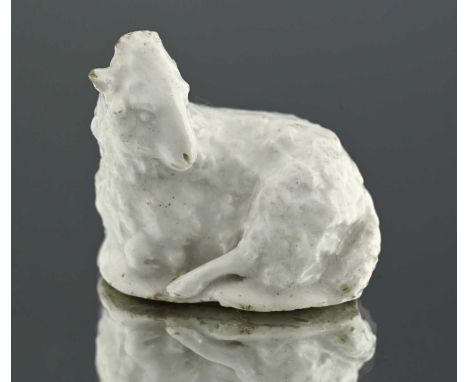 A rare early English white sculptural porcelain figure of a recumbent ram, probably Lowestoft circa 1770 or earlier, of small