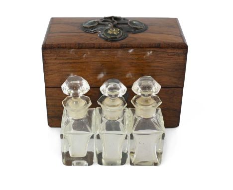 An Arts and Crafts rosewood and enamelled copper scent casket, cuboid form applied with cartouches of knotted lily pads, the 