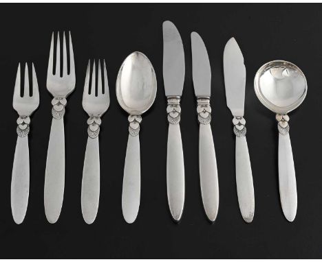 Gundorph Albertus for Georg Jensen, a suite of Cactus pattern eight-piece silver/steel place settings for six, designed circa
