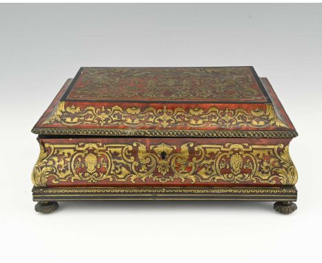 A 19th century Boulle work cigar box, bombe casket form, the platform top inlaid with chased brass in the Chinoiserie Rococo 