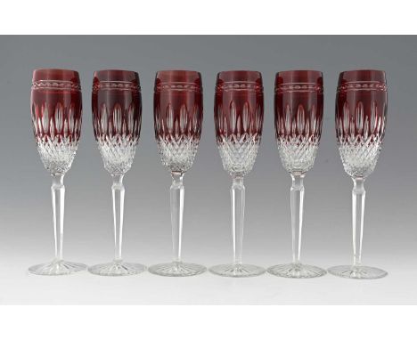 Waterford Crystal, a set of six Clarendon ruby cased cut glass champagne flutes, etched marks, 25.5cm high (6)