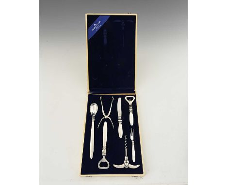Gundorph Albertus for Georg Jensen, an Art Deco silver Cactus pattern seven piece bar tool set, designed circa 1930, includin