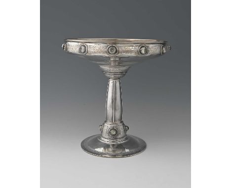 Bernard Cuzner for Liberty and Co., a large Arts and Crafts silver and stone set pedestal bowl, Birmingham 1917, the double o