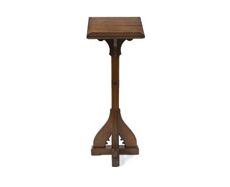 An oak lectern, late 19th century, of Gothic Revival design, incorporating blind quatrefoil and open tracery, 127cm high, 45c