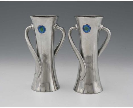 Liberty and Co., a pair of Tudric Arts and Crafts pewter and enamelled vases, model 030, waisted form with two wrythen tendri