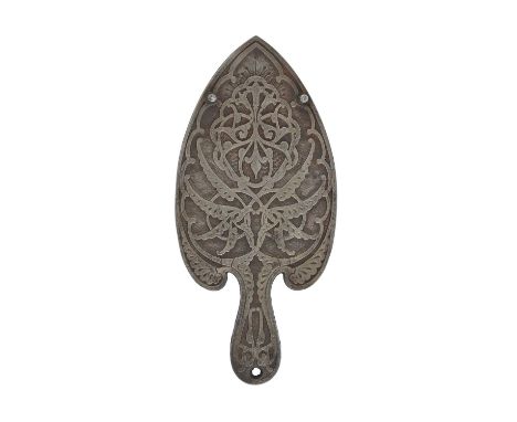 Christopher Dresser for A Kenrick and Sons, an Aesthetic Movement cast iron trivet, 1884, spade form, modelled in relief with