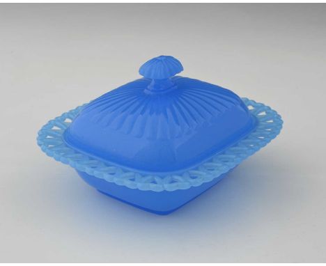 A French blue opaline glass dish and cover, cushioned form with reticulated heart motif rim, the lid moulded with radiating r