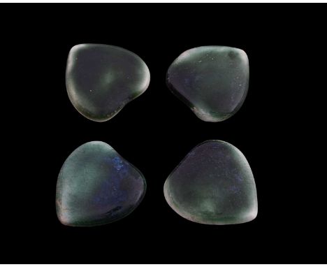 Ruskin Pottery, a set of four Souffle glazed heart shaped plaques, each in graduated green glaze, stamped marks, 3.8cm (4)