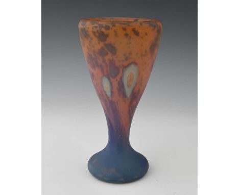 Daum, a French Art Deco glass vase, pate de verre, footed conical form, frosted in mottled orange to blue, with opaque rosett