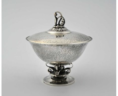 Georg Jensen, a Danish Skonvirke silver Blossom bowl and cover, model 234, designed circa 1920, planished with everted rim, o
