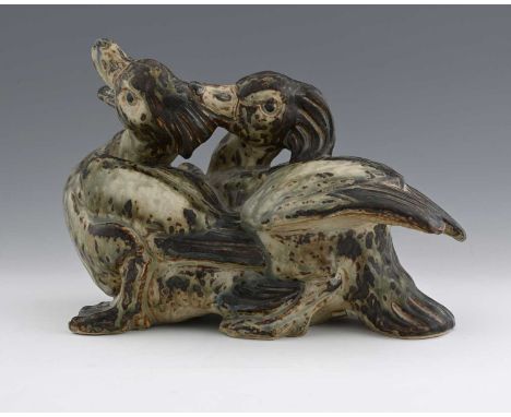 Knud Kyhn for Royal Copenhagen, two fighting ducks, No.20281, painted marks and incised initials, 24cm high, 33cm wide