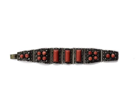 A mid 20th century Chinese silver coral bracelet, stamped China Silver, length 15.5cm, width 2.5cm, 29.5g