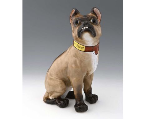 A Galle faience pug, early 20th Century, modelled seated on hind legs, inset glass eyes, captioned collar 'Monsieur le Baron'