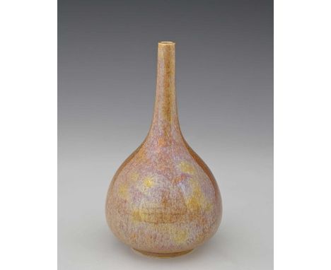 Ruskin Pottery, a Lustre glazed vase, 1922, narrow necked bulbous bottle form, mottled orange over yellow, impressed marks, 1