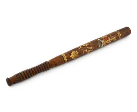 A Victorian turned wood and painted truncheon, decorated in gilt with the Royal Cypher and crown and eight pointed star, 44.5