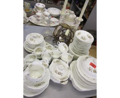 An early 20th century part dinner and coffee service, together with a pair of ceramic table lights and a painted glass decant