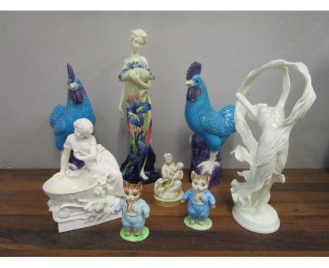 A group of ceramic figurines to include a Copeland figural salt, Old Tupton ware figurine, Royal Worcester figurine, Beswick 