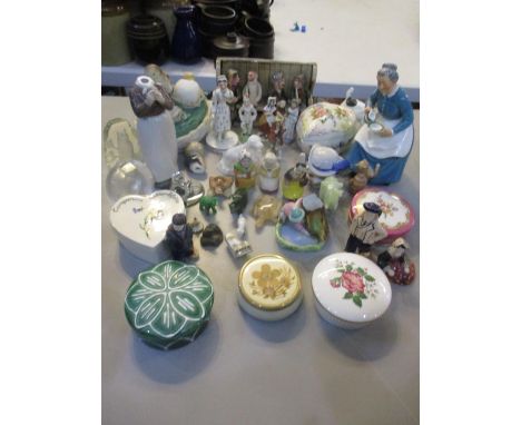19th century and later figures and model of animals to include Runnaford Pottery, Royal Doulton figure of a lady feeding a ca