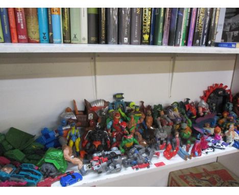 A quantity of 1980s toy figures to include Teenage Mutant Ninja Turtles and other toys 