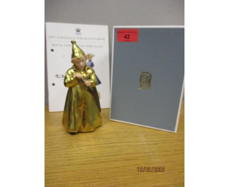 A Royal Copenhagen figure Sandman No 1145 with a gilt coat and branded box 