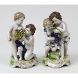 2 Puttenfiguren mit Früchten, Sachsen um 1900, jeweils mit 2 Figuren, Porzellan, weißer Scherben,