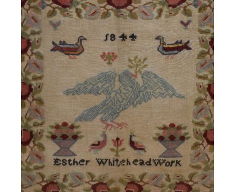 An early Victorian polychrome pictorial needlework sampler, decorated with birds and flowers, dated 1844 and marked 'Esther W