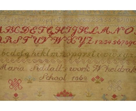 A Victorian needlework alphabet sampler, worked in polychrome threads by Maria Siddall, Wheldrake School 1862, within a mahog