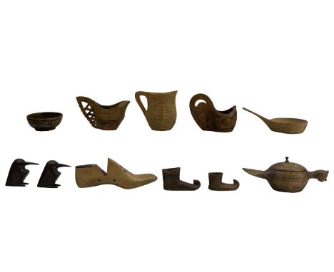 Scandinavian chip carved ornaments to include a bird form bowl and cover, drinking vessels, shoes, bowls etc, together with a