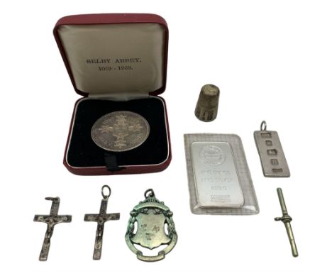 Selby Abbey 1069-1969 commemorative silver medallion, cased, a one ounce fine silver bar, a silver ingot pendant, a silver th