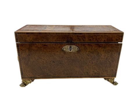 Early to mid 19th century burr yew wood tea caddy, of sarcophagus form with string banding, the fitted interior with velvet l