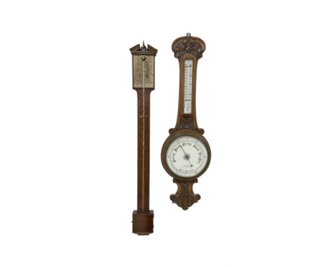 Mid-20th century mercury stick barometer and an early 20th century aneroid wheel barometer. Mahogany stick barometer with a b