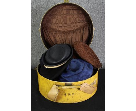 A vintage dressing box, with various vintage hats. H.46 W.47 D.24cm. (box) 