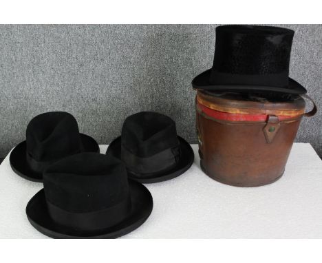 A vintage top hat and box, and three felt fedoras. H.22 W.36 D.27cm. (box). 