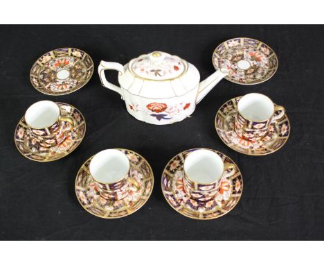 4 cups and 6 saucers of Crown Derby Imari and a Bali pattern teapot. H.11cm. (largest). 