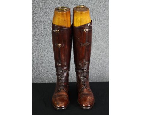 A pair of vintage brown leather ladies riding boots within shoe trees. H.47. No size. 