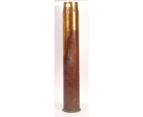 A WWI First World War period Polish large brass Trench Art umbrella stand fashioned from an artillery shell. Stamped to base 
