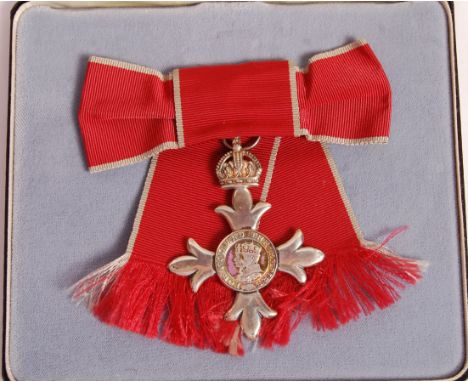 A WWI First World War era George V MBE (Member Of The British Empire) medal. Recipient unknown, but MBE marked with twin Roya