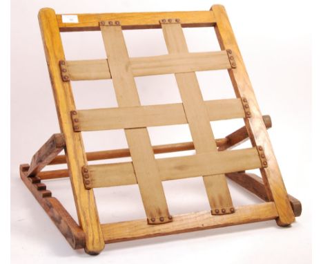 A WWI First World War era medics medical stretcher / bed back prop or rest made of oak and canvas webbing having multiple rec