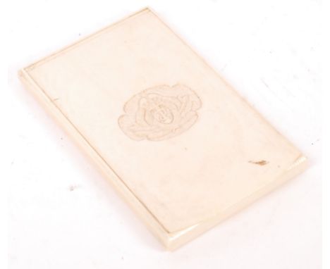 An original antique WWI First World War British Navy Naval maritime ivory calling card case having a hinged lid with insignia