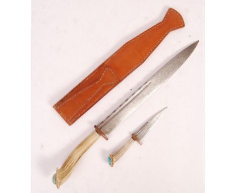 A fine quality late 20th century two piece hunting knife set. Both knives comprising of antler handles with fixed gem stone p