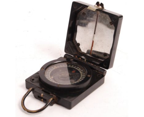 An original WWII Second World War military Compass Magnetic Marching Mark 1 stamped B26772 by TG Co Ltd. Bakelite folding con
