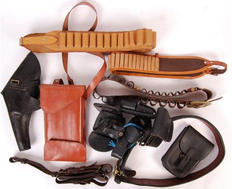 A collection of assorted 20th century replica / re-enactment / firearm related leather belts and pouches. To include; a quali