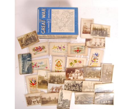 A WWI First World War postcard collection - largely real photo postcards - a few of which appear to have been written by the 